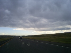 Slice of the Big Sky between the road and the storm